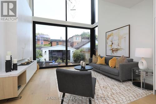 23 Cavell Avenue, Toronto (North Riverdale), ON - Indoor Photo Showing Living Room With Fireplace