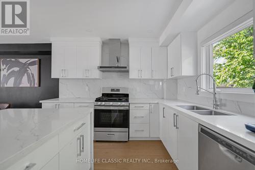 858 Danforth Rd, Toronto (Kennedy Park), ON - Indoor Photo Showing Kitchen With Double Sink