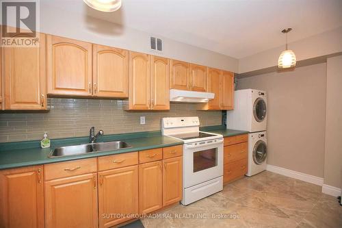 703 - 60 Inverlochy Boulevard, Markham (Royal Orchard), ON - Indoor Photo Showing Kitchen With Double Sink