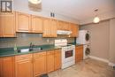 703 - 60 Inverlochy Boulevard, Markham (Royal Orchard), ON  - Indoor Photo Showing Kitchen With Double Sink 