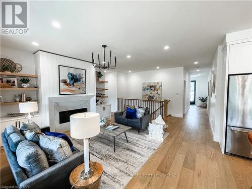 91 Allister Drive, Middlesex Centre (Kilworth), ON - Indoor Photo Showing Living Room With Fireplace