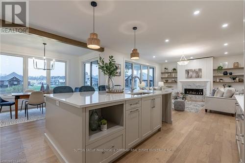 52 Allister Drive, Middlesex Centre (Kilworth), ON - Indoor Photo Showing Kitchen With Fireplace With Upgraded Kitchen