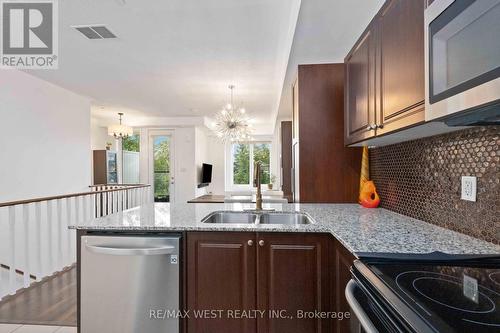 111 - 256 Royal York Road, Toronto (Mimico), ON - Indoor Photo Showing Kitchen With Double Sink