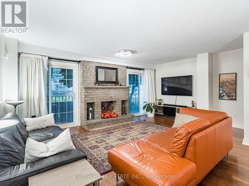 1451 Credit Woodlands Court, Mississauga, ON - Indoor Photo Showing Living Room With Fireplace