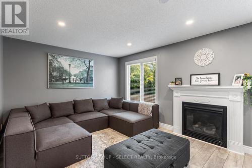 50 Crimson Crescent, London, ON - Indoor Photo Showing Living Room With Fireplace