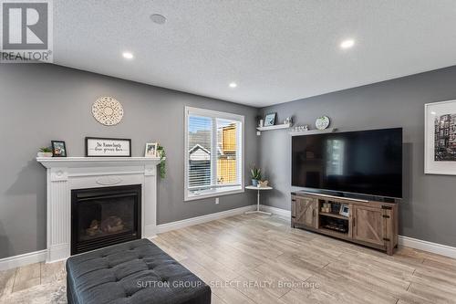 50 Crimson Crescent, London, ON - Indoor Photo Showing Living Room With Fireplace