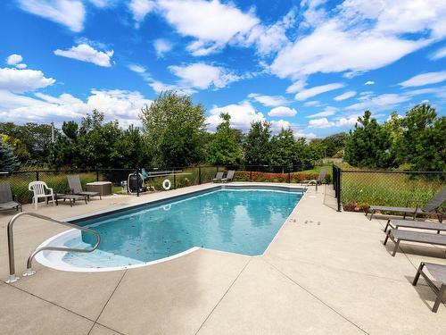 Piscine - 308-8255 Boul. Leduc, Brossard, QC - Outdoor With In Ground Pool With Backyard