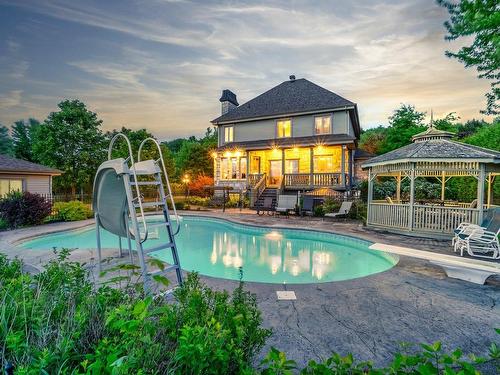 Back facade - 1830 Rue De Valencay, Sherbrooke (Fleurimont), QC - Outdoor With In Ground Pool With Deck Patio Veranda With Backyard