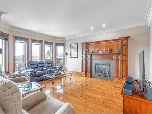 Salle familiale - 1830 Rue De Valencay, Sherbrooke (Fleurimont), QC - Indoor Photo Showing Living Room With Fireplace