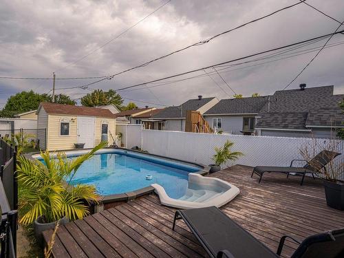 Piscine - 2204 Rue Mélisande, Laval (Saint-François), QC - Outdoor With In Ground Pool With Deck Patio Veranda