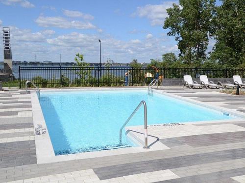 Piscine - 2505-299 Rue De La Rotonde, Montréal (Verdun/Île-Des-Soeurs), QC - Outdoor With In Ground Pool