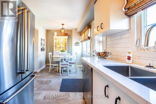 102 - 10 Bassett Boulevard, Whitby (Pringle Creek), ON - Indoor Photo Showing Kitchen With Double Sink