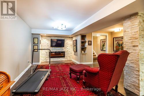 102 - 10 Bassett Boulevard, Whitby (Pringle Creek), ON - Indoor Photo Showing Other Room With Fireplace