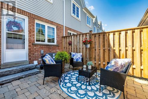 102 - 10 Bassett Boulevard, Whitby (Pringle Creek), ON - Outdoor With Deck Patio Veranda With Exterior