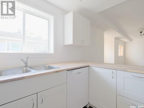 714 Main Street, Rosetown, SK - Indoor Photo Showing Kitchen With Double Sink