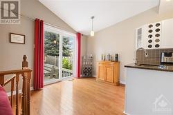 Eating area with patio doors to fenced yard - 