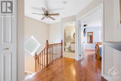 Upper hallway with hardwood floors - 