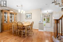 Large dining room with hardwood floors just off the kitchen - 