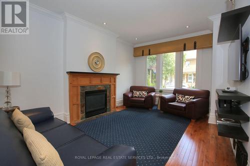 32 Coady Avenue, Toronto (South Riverdale), ON - Indoor Photo Showing Living Room With Fireplace