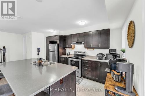 8 - 1222 Rose Way, Milton (Cobban), ON - Indoor Photo Showing Kitchen With Stainless Steel Kitchen With Double Sink