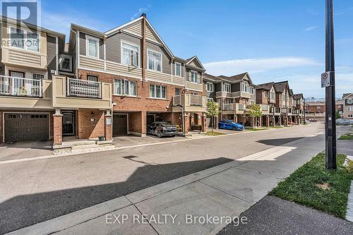 8 - 1222 Rose Way, Milton (Cobban), ON - Outdoor With Facade