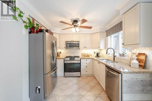 12 Teston Street, Brampton (Fletcher'S Meadow), ON - Indoor Photo Showing Kitchen With Double Sink