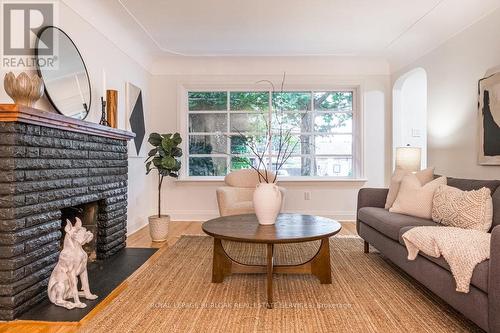 299 Merle Avenue, Burlington (Lasalle), ON - Indoor Photo Showing Living Room With Fireplace