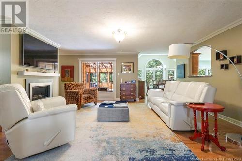 90 Bonaventure Street, Dieppe, NB - Indoor Photo Showing Living Room With Fireplace