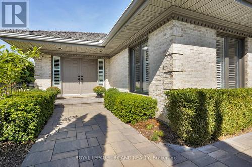 Beautifully landscaped entry - 31 - 1200 Riverside Drive, London, ON - Outdoor With Facade