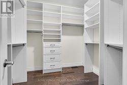 Primary suite walk in complete with built-ins - 