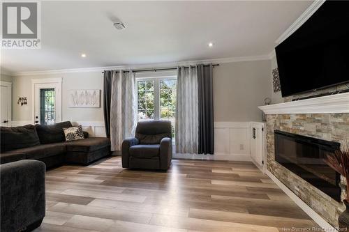 67 Eastwood Avenue, Moncton, NB - Indoor Photo Showing Living Room With Fireplace