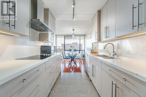 907 - 2 Glamorgan Avenue, Toronto (Dorset Park), ON - Indoor Photo Showing Kitchen With Double Sink