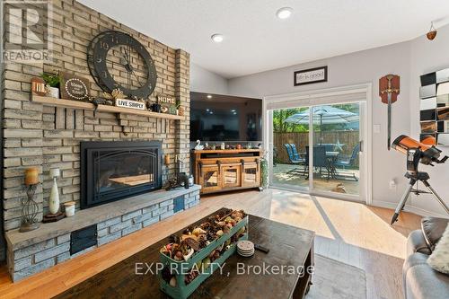 10 Thompson Court S, Belleville, ON - Indoor Photo Showing Living Room With Fireplace