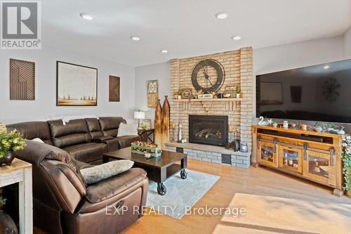 10 Thompson Court S, Belleville, ON - Indoor Photo Showing Living Room With Fireplace