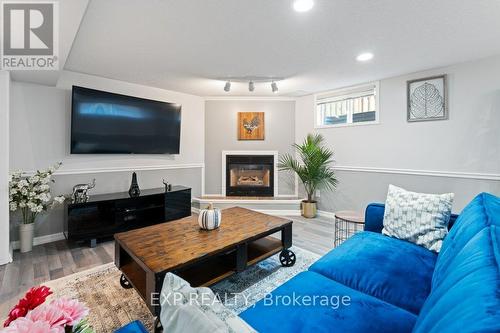 10 Thompson Court S, Belleville, ON - Indoor Photo Showing Living Room With Fireplace