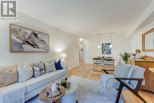 102 - 2371 Queen Street E, Toronto (The Beaches), ON - Indoor Photo Showing Living Room