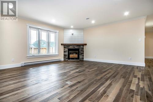 37 Kennedys Lane, Holyrood, NL - Indoor Photo Showing Living Room With Fireplace