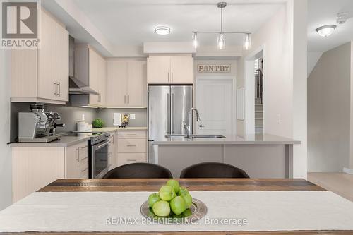 29 Oliana Way, Brampton (Bram West), ON - Indoor Photo Showing Kitchen With Upgraded Kitchen