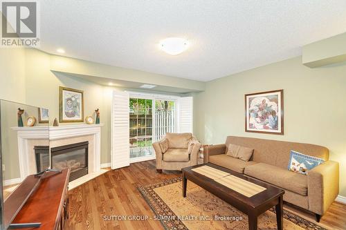 5 - 485 Bristol Road W, Mississauga, ON - Indoor Photo Showing Living Room With Fireplace