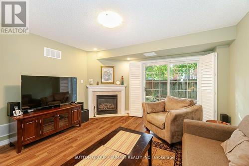 5 - 485 Bristol Road W, Mississauga (Hurontario), ON - Indoor Photo Showing Living Room With Fireplace