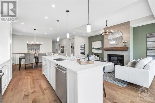 608 Gendarme Circle, Ottawa, ON - Indoor Photo Showing Kitchen With Fireplace With Double Sink With Upgraded Kitchen