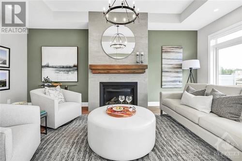 608 Gendarme Circle, Ottawa, ON - Indoor Photo Showing Living Room With Fireplace