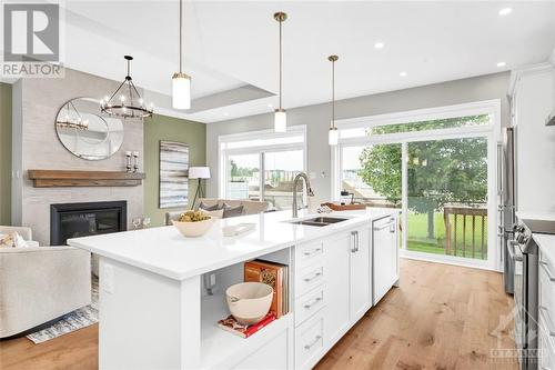 608 Gendarme Circle, Ottawa, ON - Indoor Photo Showing Kitchen With Fireplace With Double Sink