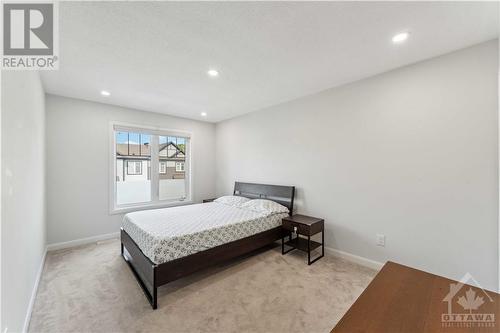 Primary Bedroom - 209 Attwell Private, Kanata, ON - Indoor Photo Showing Bedroom