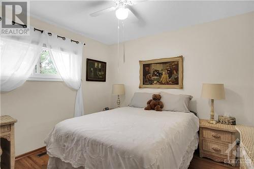 Primary Bedroom...note light fixture with ceiling fan. - 2536 Traverse Drive, Ottawa, ON - Indoor Photo Showing Bedroom