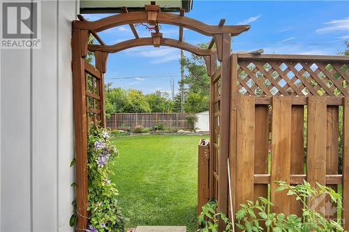 Gate to beautifully landscaped fully fenced private backyard. - 2536 Traverse Drive, Ottawa, ON - Outdoor