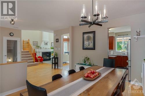 14 Maple Stand Way, Ottawa, ON - Indoor Photo Showing Dining Room With Fireplace