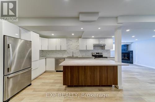 141 Wasaga Sands Drive, Wasaga Beach, ON - Indoor Photo Showing Kitchen With Upgraded Kitchen