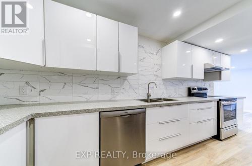 141 Wasaga Sands Drive, Wasaga Beach, ON - Indoor Photo Showing Kitchen With Double Sink