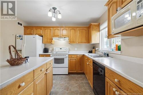 26 Arthur Street, Moncton, NB - Indoor Photo Showing Kitchen With Double Sink